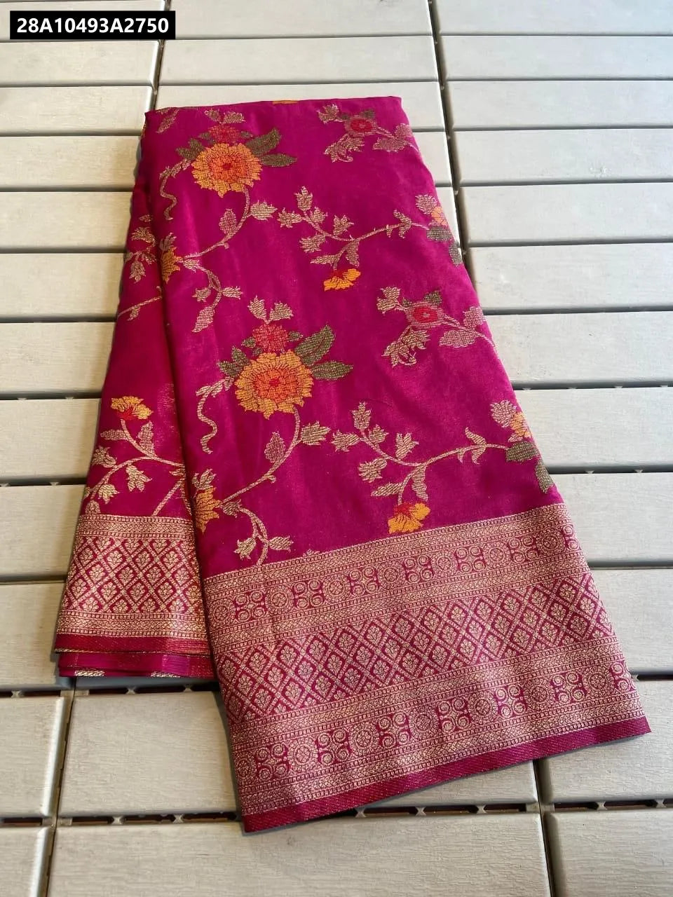 Magenta Pure Crepe Khadi Silk Saree with intricate Zari and Meenakari weaving, flat lay