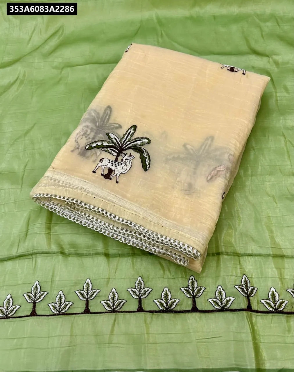 TRENDBUY Pure Gold Crush Silk Saree with Embroidery and Cut Work, folded showcasing the intricate design.