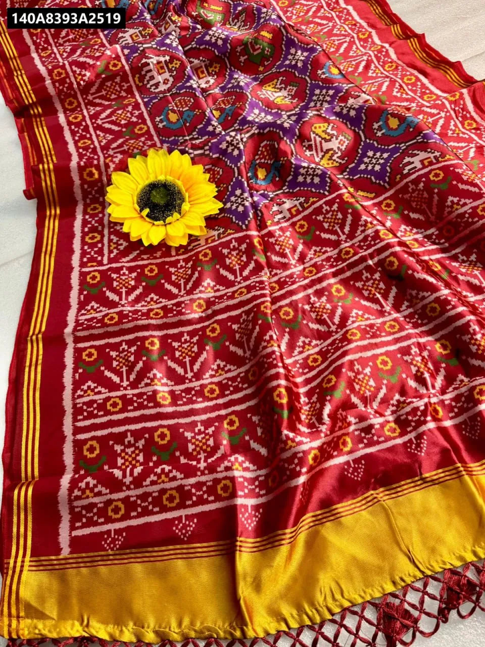 TRENDBUY Pure Patola Silk Saree Red and Purple traditional weave flat lay