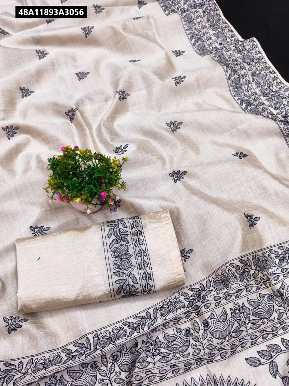 TRENDBUY Pure Tussar Saree in Cream with Charcoal Embroidery and Matching Blouse Piece - Flat Lay Front View