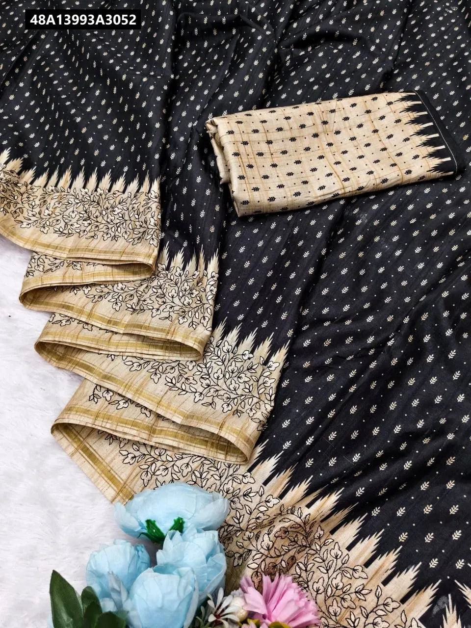 TRENDBUY Pure Tussar Saree in Black with Multi-thread Embroidery and Piping Border, flat lay