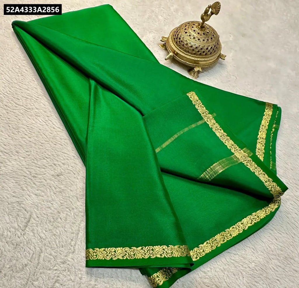 TRENDBUY Green Pure Viscose Silk Saree with Fancy Golden Border and Brass Decor