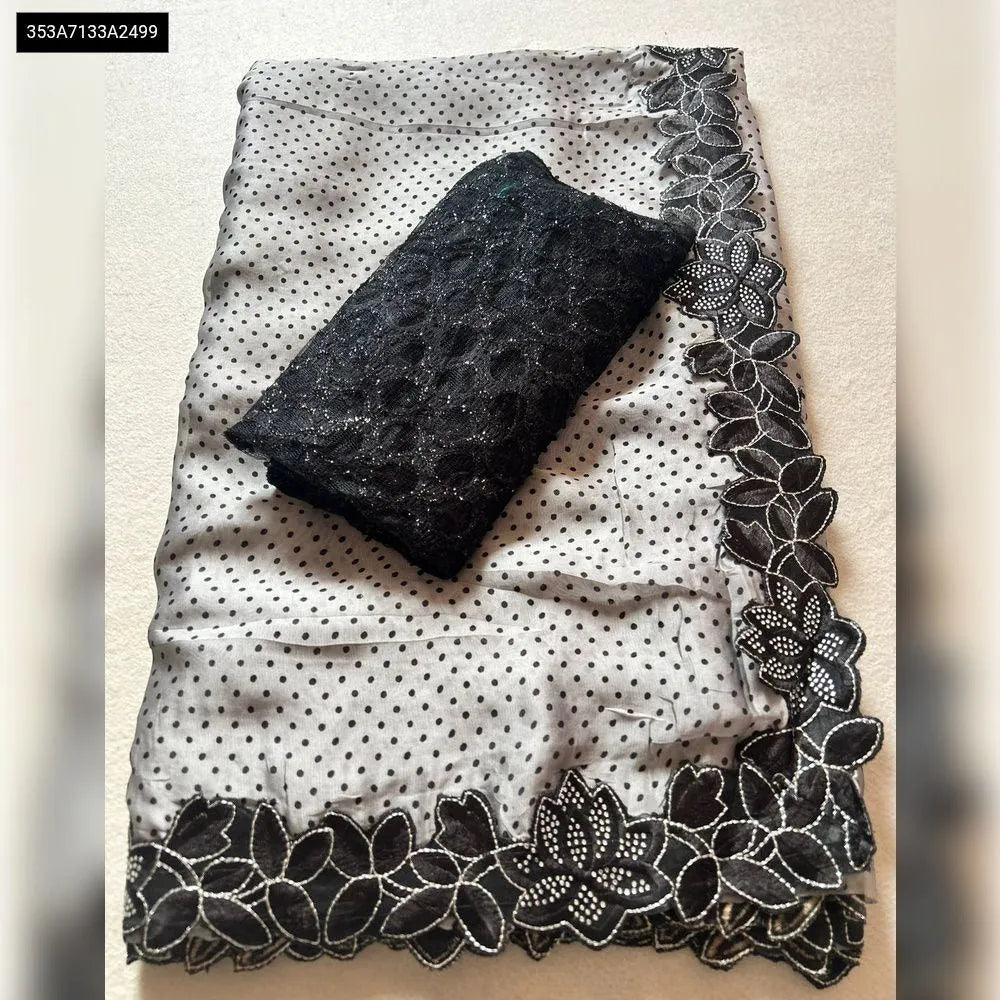 TRENDBUY Rangoli Satin Polka Dot Saree with black cut-work border and contrast blouse, folded