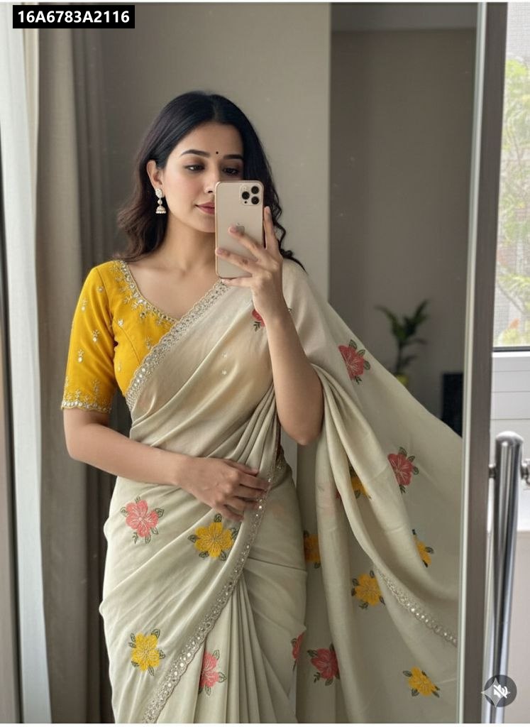 TRENDBUY model in Pista Green Rangoli Silk Saree with mustard blouse, mirror selfie