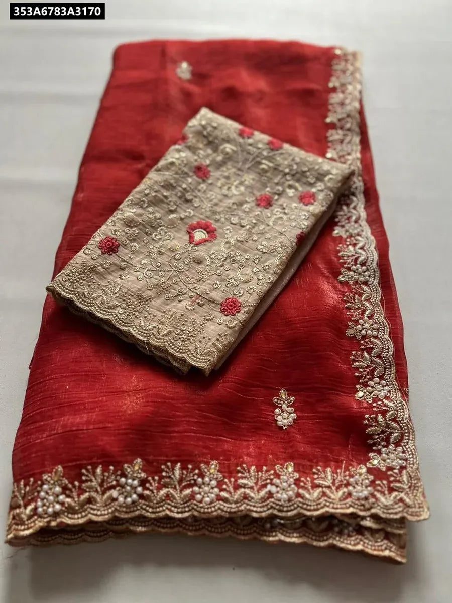 TRENDBUY Red Crunchy Chiffon Crush Silk Saree with embroidered pallu and contrast blouse, flat lay.