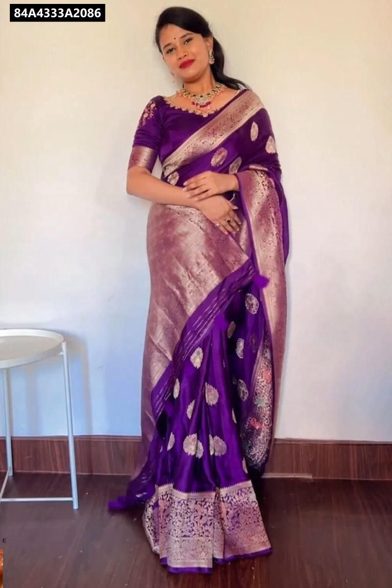 Model wearing Royal Purple Lichi Silk Saree with jacquard work and rich pallu, front view.