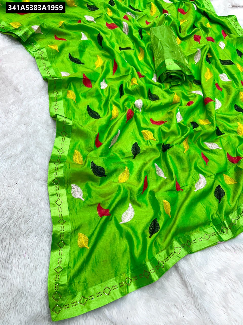 TRENDBUY Sana Silk Saree with Leaf Embroidery and Siroski Diamond Lace Border in Green