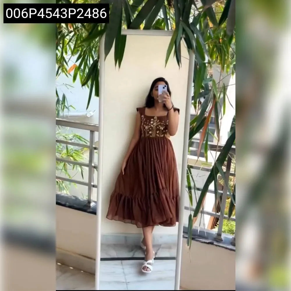 Full body view of woman in brown sequin georgette maxi dress for party wear