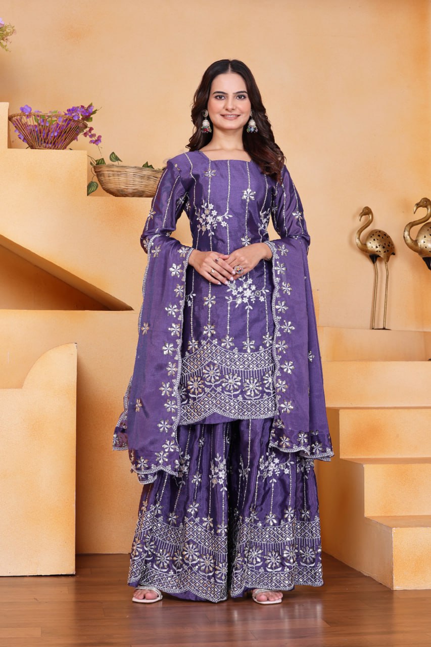 Woman posing in full shot of purple Chinon sequence embroidered sharara set.