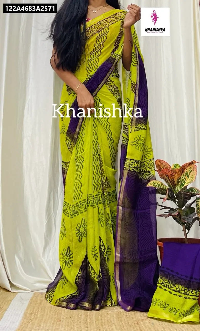 Model in a lime green mulmul cotton Shibori saree with purple contrast pallu and zari border.