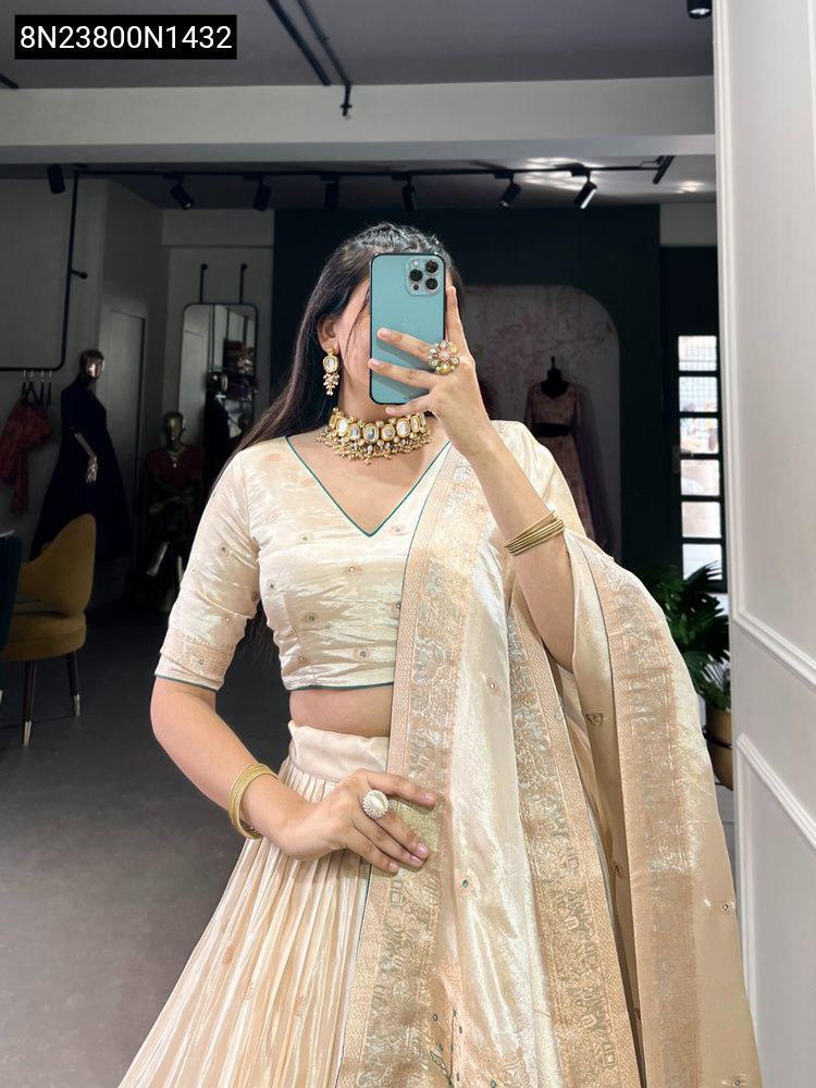 TRENDBUY Shimmer Mirror Work Lehenga in Cream with Teal Accents, front view