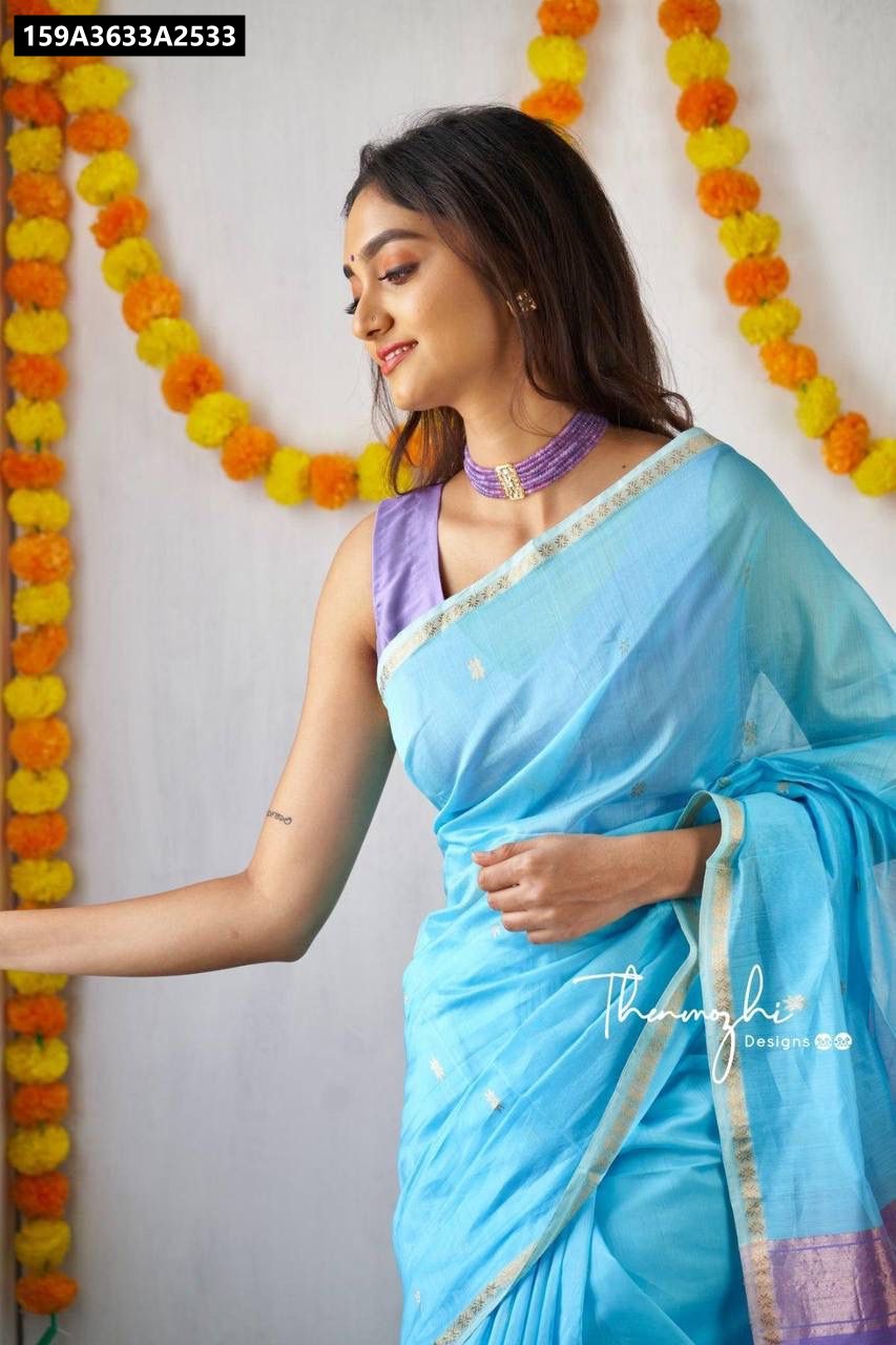 Close-up of model in the dual-tone Lilan Slab Saree with 'Thenmozhi Designs' watermark.