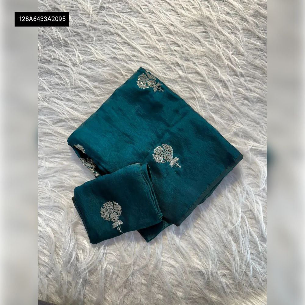 TRENDBUY Soft Space Silk Sequin Saree in Teal with Blouse Piece, flat lay.