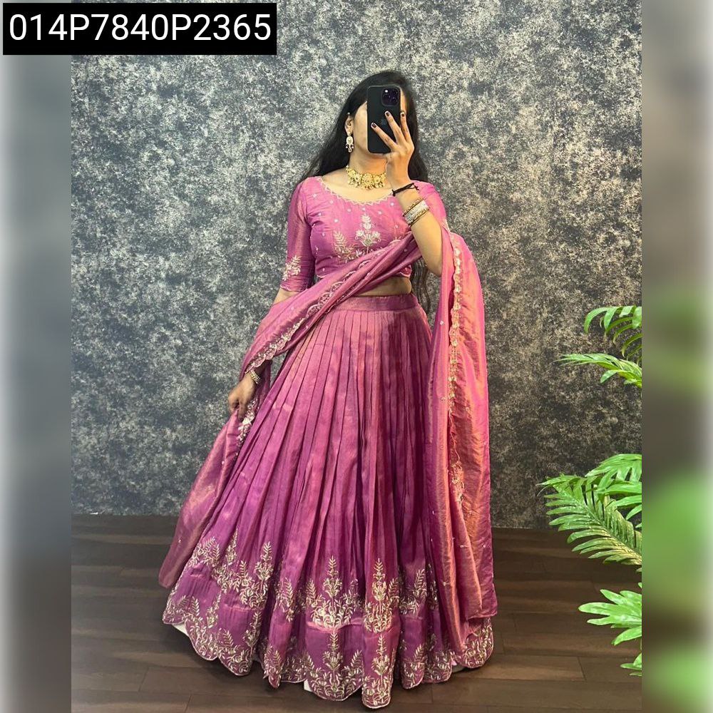 TRENDBUY Fuchsia Pink South Tissue Lehenga with intricate embroidery and sequence work, modeled front-facing.