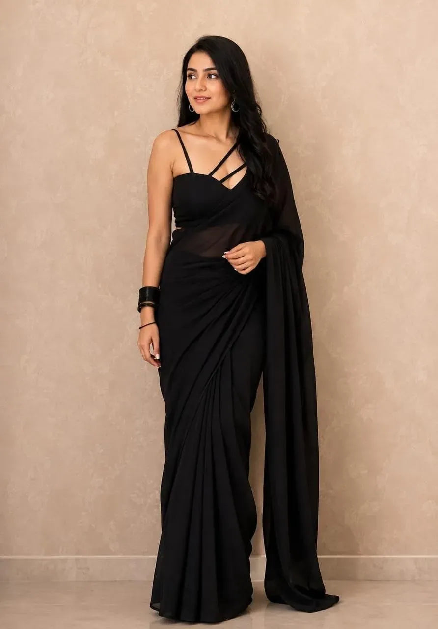 Model wearing black 1 minute ready to wear georgette saree