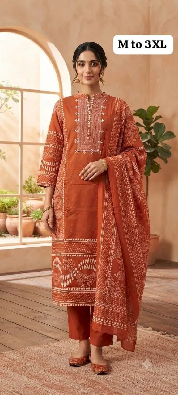 Close-up of model wearing terracotta cotton kurta with detailed embroidery