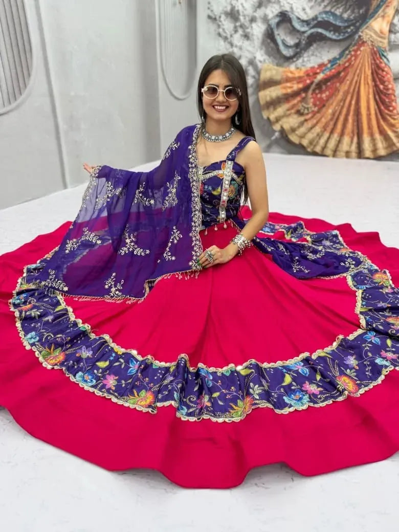 Woman in magenta pink and purple lehenga choli sitting on floor showcasing a six meter wide flair