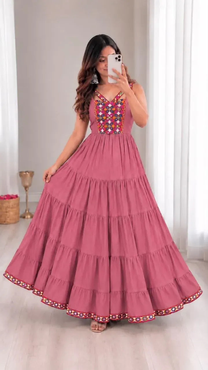 Pink heavy rayon long gown with gamthi work on model