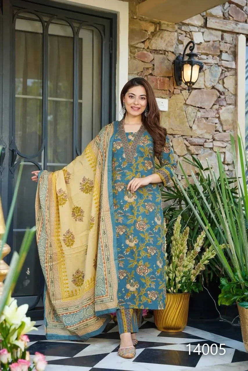 Model wearing blue printed muslin kurti with dupatta and bottom set