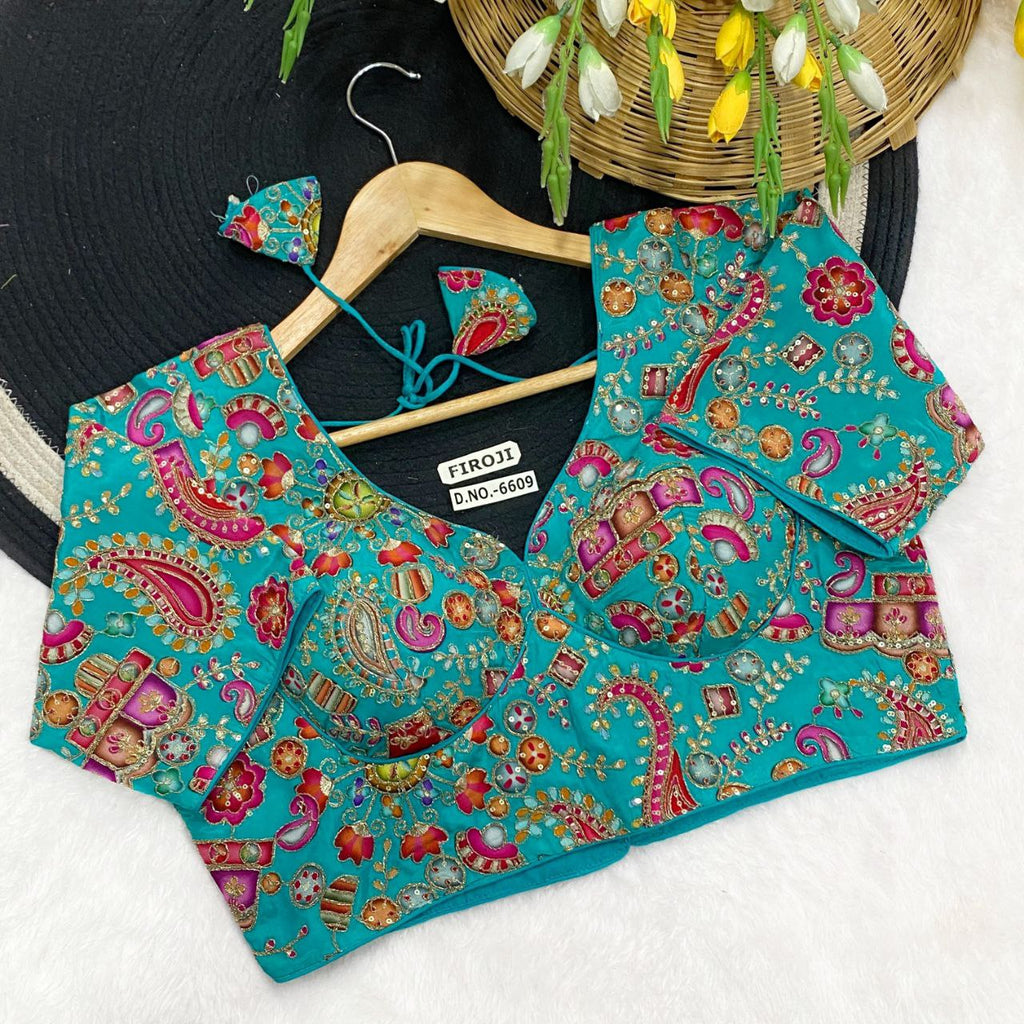 TRENDBUY Firoji embroidered party wear blouse with traditional motifs and half sleeves