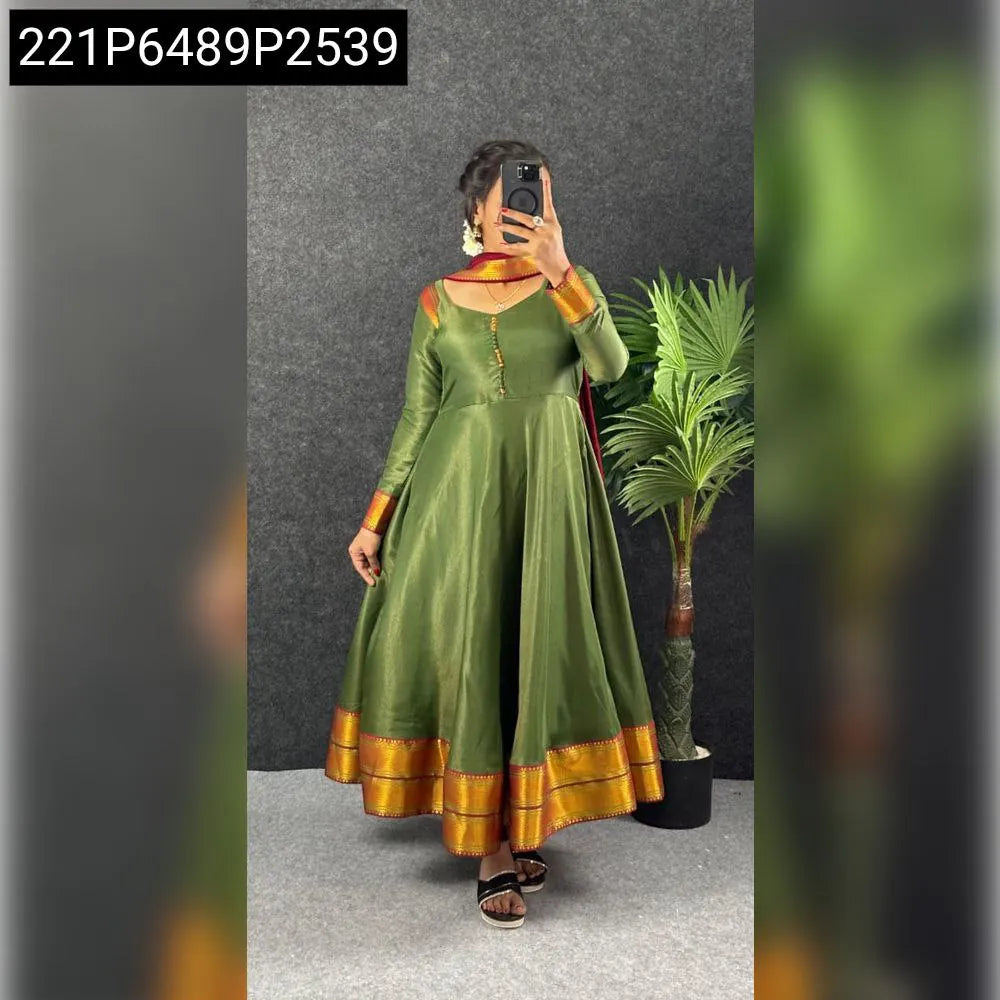 Model in Mehandi Green Kanjeevaram Zari Border Anarkali Gown with maroon dupatta