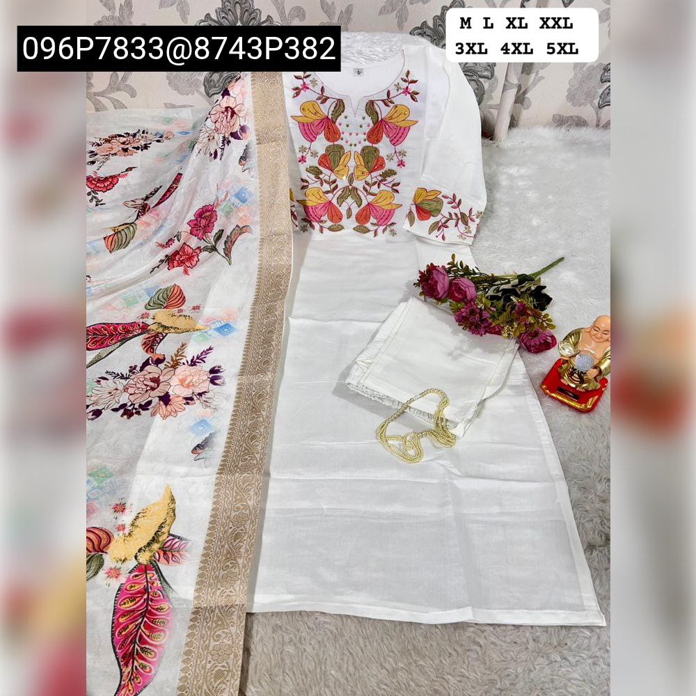 TRENDBUY White Chanderi Silk Kurti Set flat lay, featuring embroidered kurti, matching pant, and a jacquard print dupatta, adorned with flowers and a golden chain.