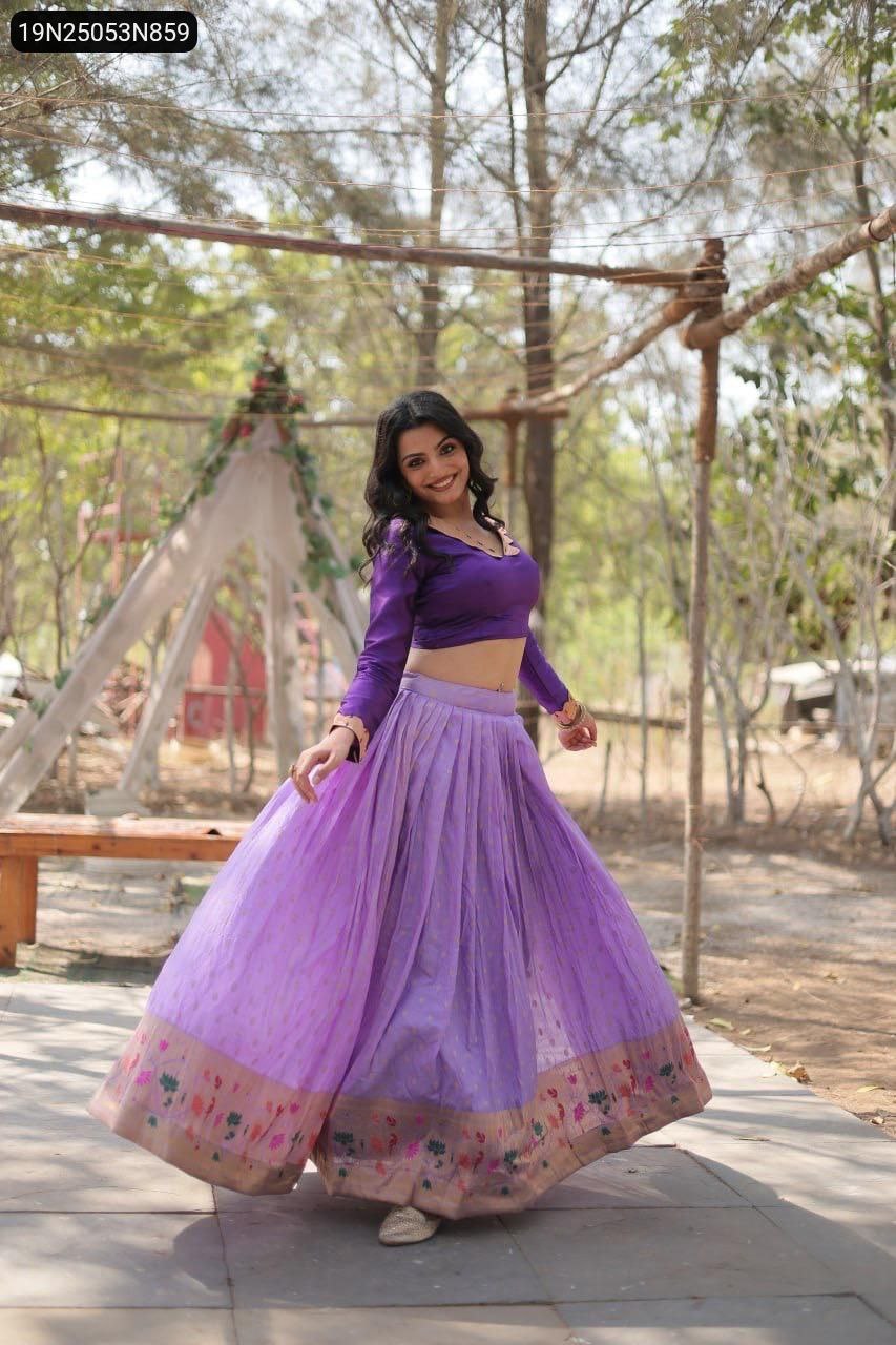 TRENDBUY Lavender Dayble Viscose Lehenga Choli with Kalamkari Jari border, worn by a smiling model spinning gracefully.