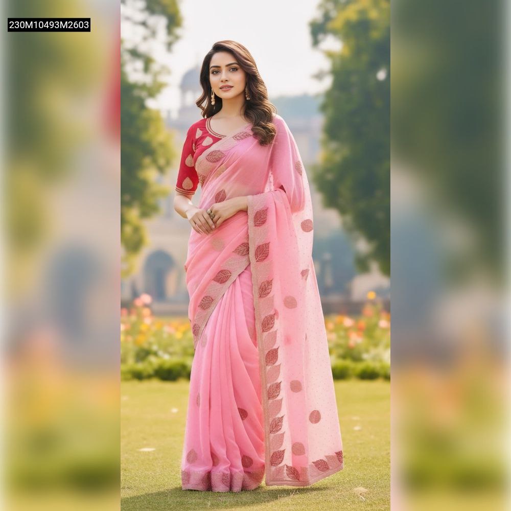 TRENDBUY Pink Soft Fandy Silk Saree with red embroidered blouse worn by a model posing elegantly in a lush garden setting.
