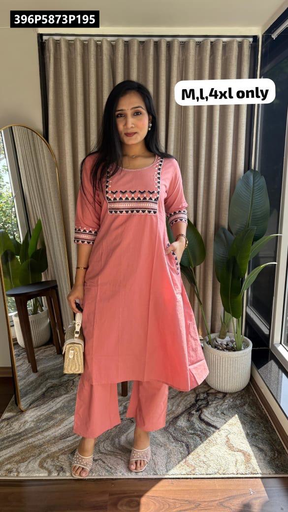 TRENDBUY Dhabu Cotton A-line Kurti and Palazzo Set in Peach, featuring beautiful embroidery on neck and double pockets, worn by a model in a full body shot.