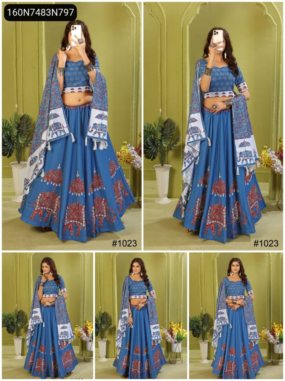 TRENDBUY Royal Blue Digital Print Lehenga Choli set with red elephant motifs, featuring a model in a full body pose holding a phone.