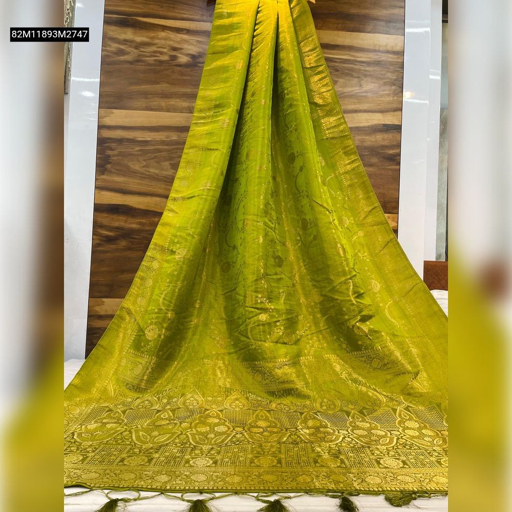 TRENDBUY Lime Green Dola Silk Saree with intricate gold Banarasi Jari weaving and elegant pallu tassels, draped on display.