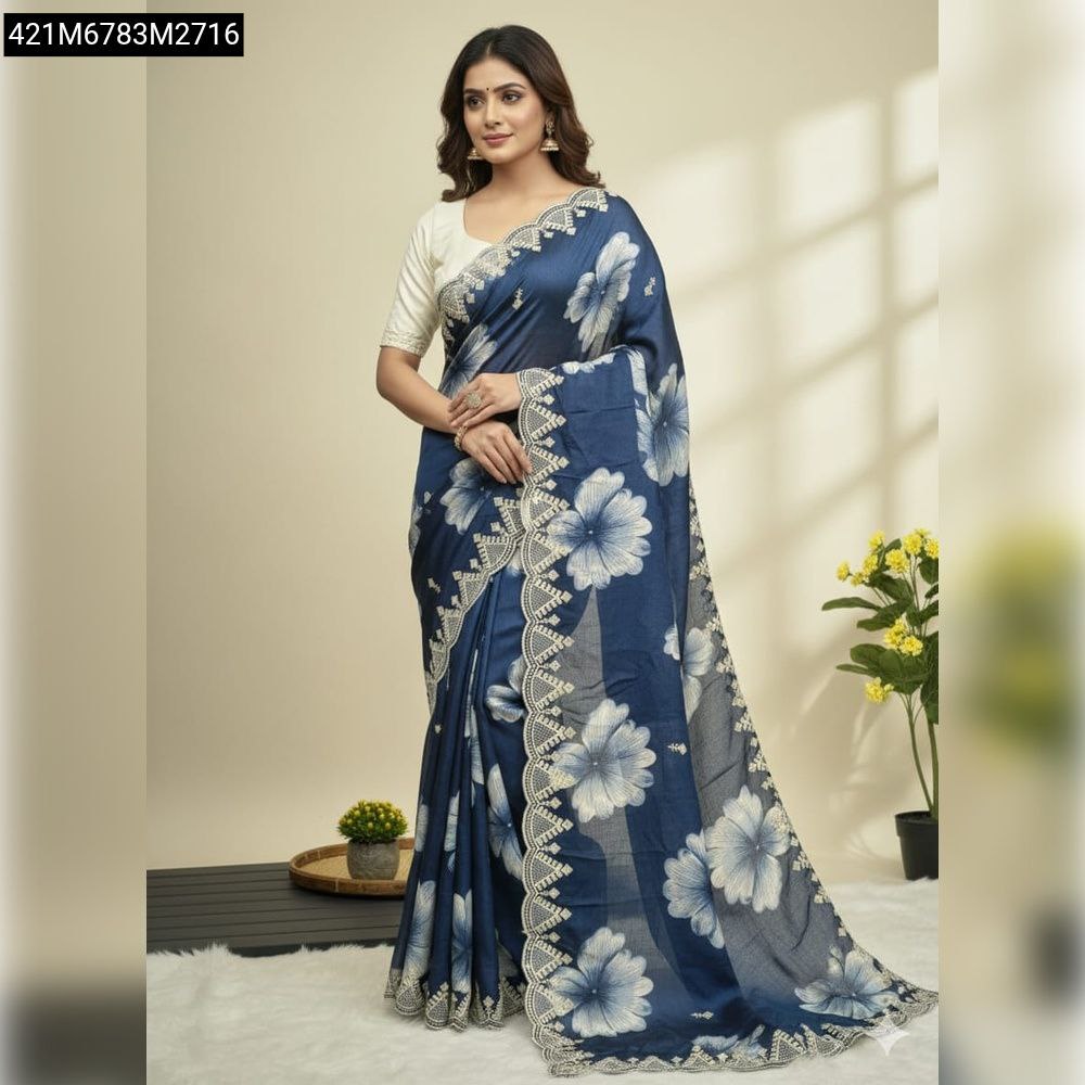 Full model shot of a woman elegantly draped in a TRENDBUY Navy Blue Chinon floral saree with an off-white silk blouse and cut work border, on a light background.