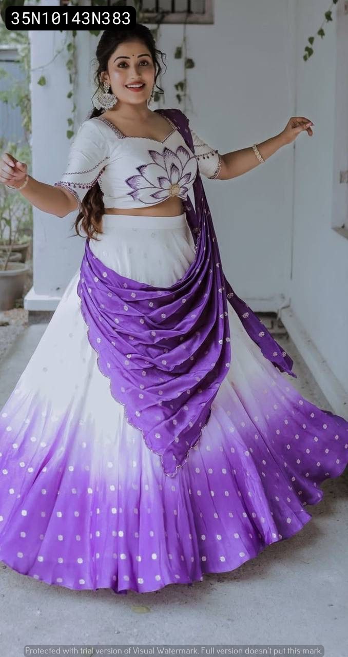 Full body shot of model gracefully posing in the TRENDBUY White and Purple Ombre Chinon Lehenga Choli set, featuring a wide flair lehenga and draped dupatta.