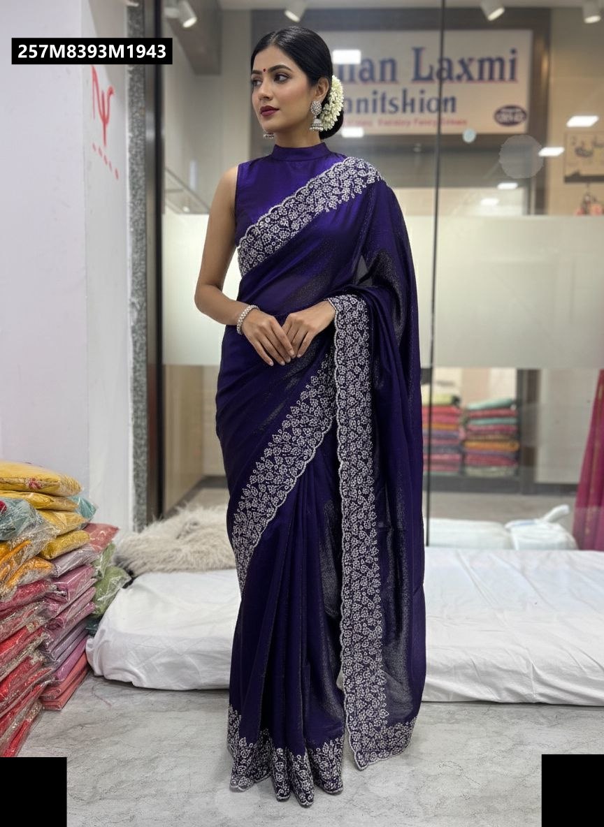 Model showcasing TRENDBUY dark purple space silk saree with elaborate white embroidered border and pallu