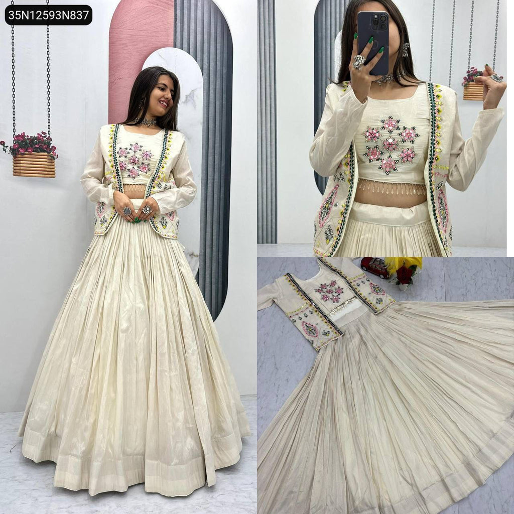 TRENDBUY cream Pure Tissue Simmer Lehenga Choli set with embroidered jacket, worn by a smiling model standing.