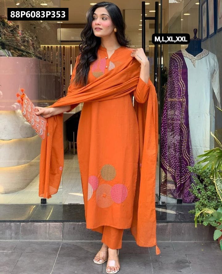 Full body shot of a woman modeling the orange TRENDBUY embroidered cotton kurta and pant set with a matching malmal dupatta, smiling.