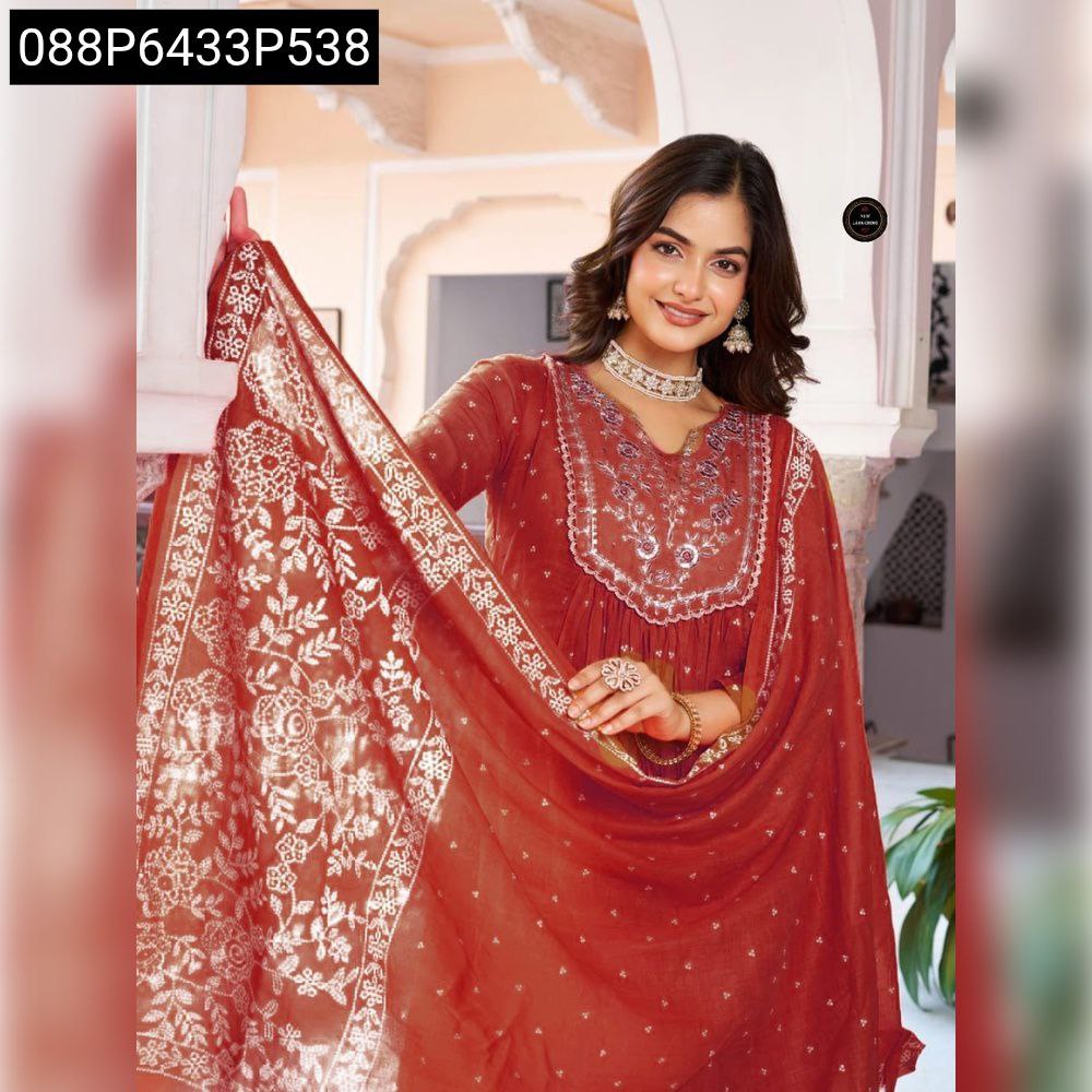 TRENDBUY model poses gracefully in a rust orange embroidered flared Anarkali kurti with a matching dupatta, showcasing the intricate work and flowing fabric.