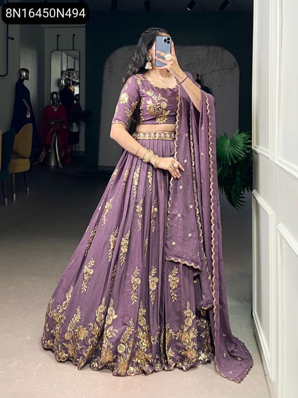 Full-body front view of a model showcasing the TRENDBUY lavender lehenga choli set with golden sequin and thread embroidery.