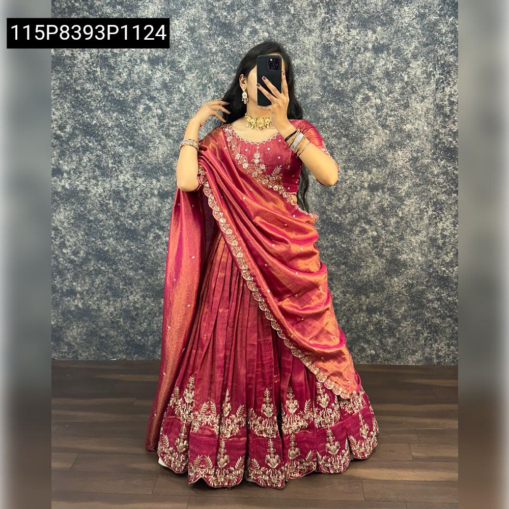 Model in full-length view wearing wine South Tissue lehenga blouse and elegantly draped embroidered dupatta, presenting a classic look.