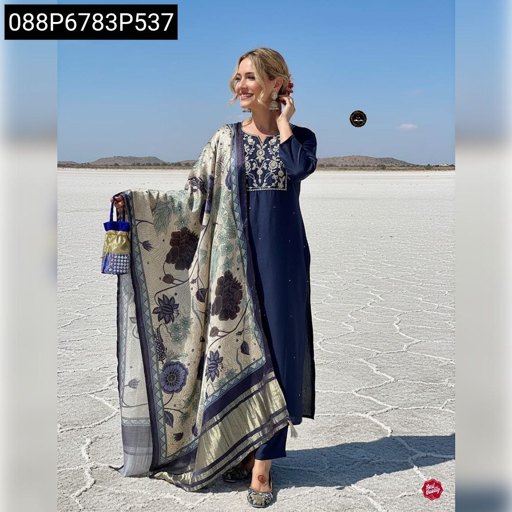 Model wearing TRENDBUY Navy Blue Embroidered Kurti Set with printed Lagdi Satin Dupatta, full body shot in a desert landscape