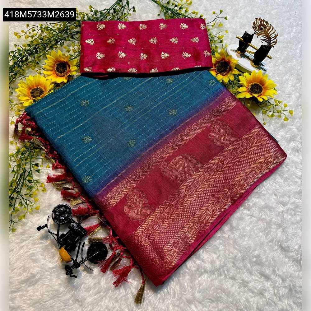 TRENDBUY Semi Dola Saree in Teal Blue and Magenta, featuring delicate golden stripes, floral butti, and a rich magenta weaving border. Styled with a matching floral blouse piece on a white textured background with sunflowers and decorative items.