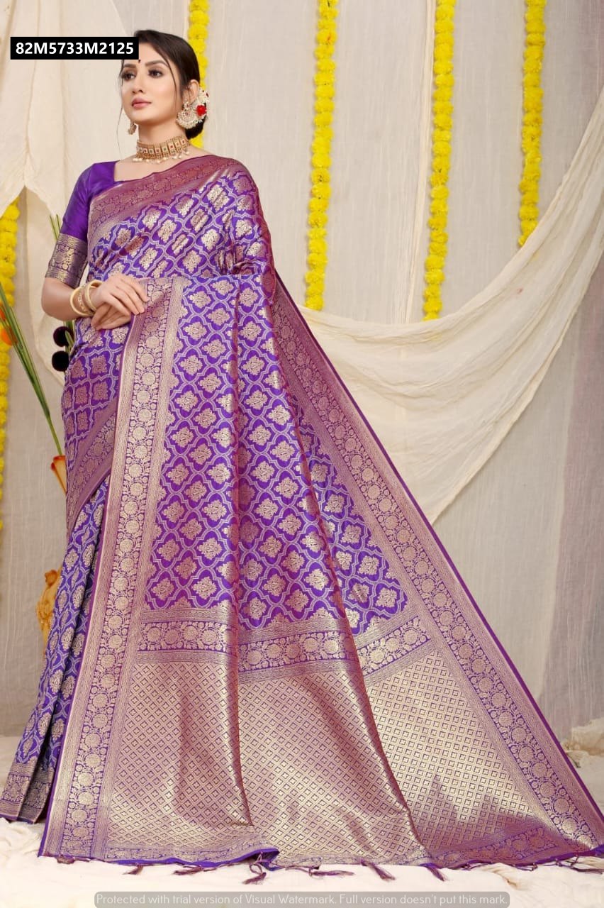 Model wearing a vibrant purple soft silk saree with intricate gold zari weaving.