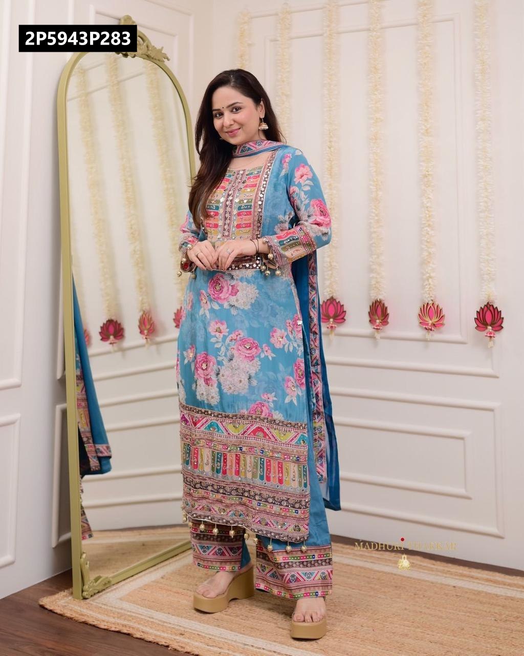 Front full body view of model showcasing the complete light blue floral Modal satin kurti, flared Santoon palazzo, and Nazmeen dupatta set.