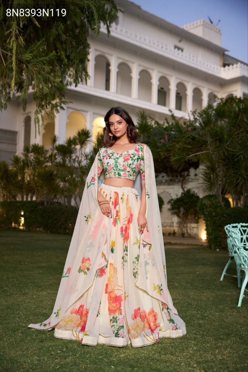 TRENDBUY Floral Print Georgette Lehenga Choli front view, model elegantly posing in a garden setting, showcasing the full outfit with draped dupatta.