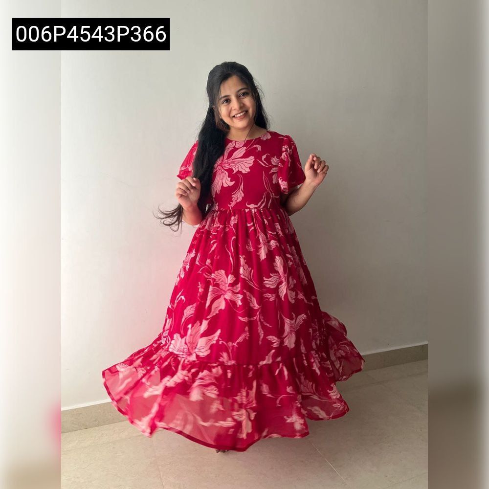 Joyful full body shot of a young woman with arms raised, twirling happily in TRENDBUY Florissa Pink Floral Georgette Midi Dress.