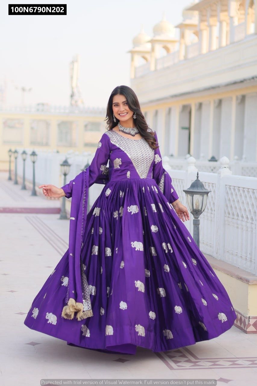 Model in TRENDBUY Purple Fox Georgette Gown with full flair and elephant sequence embroidery, posing outdoors.