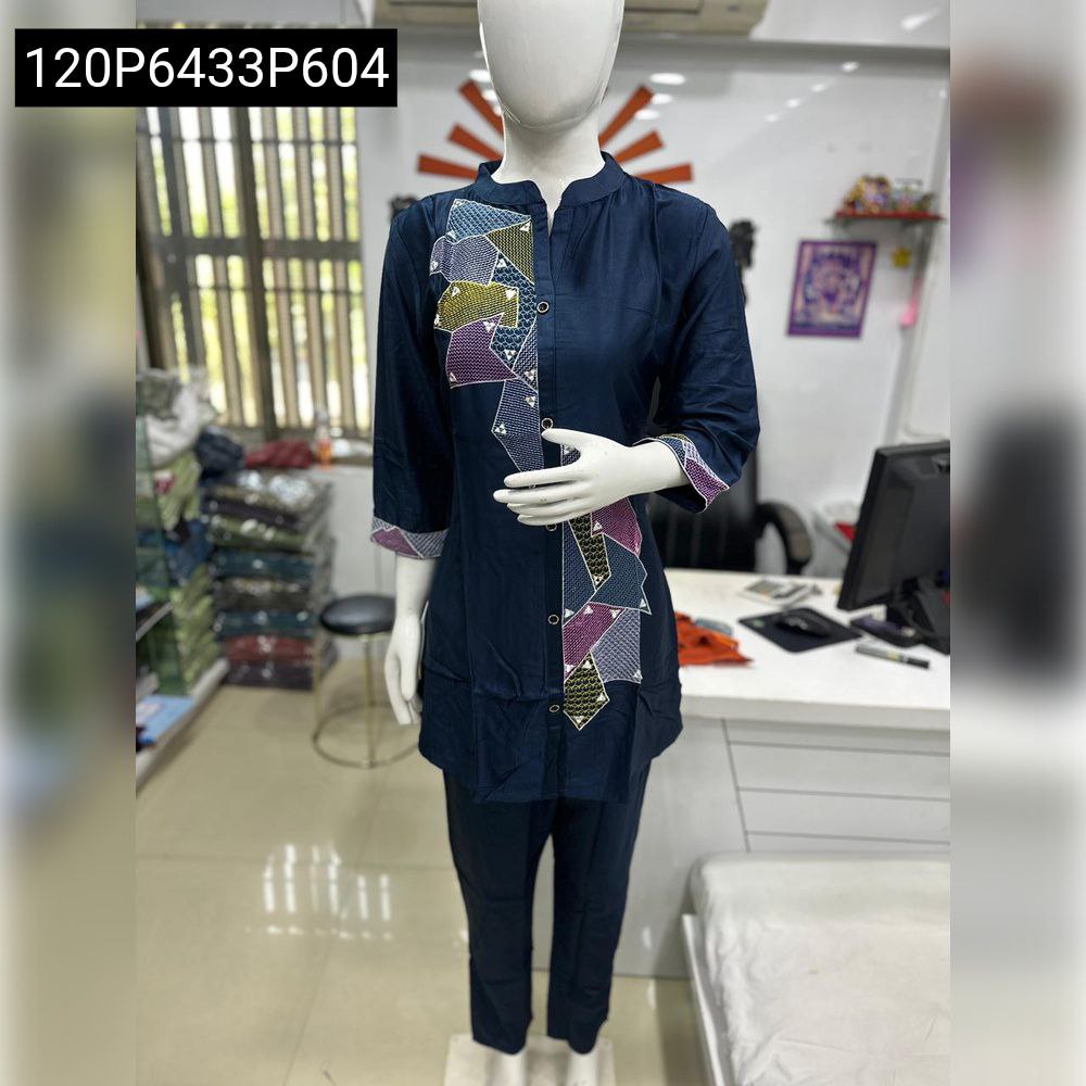 TRENDBUY Gaji Silk tunic and pant set in navy blue with geometric mirror work embroidery on a mannequin
