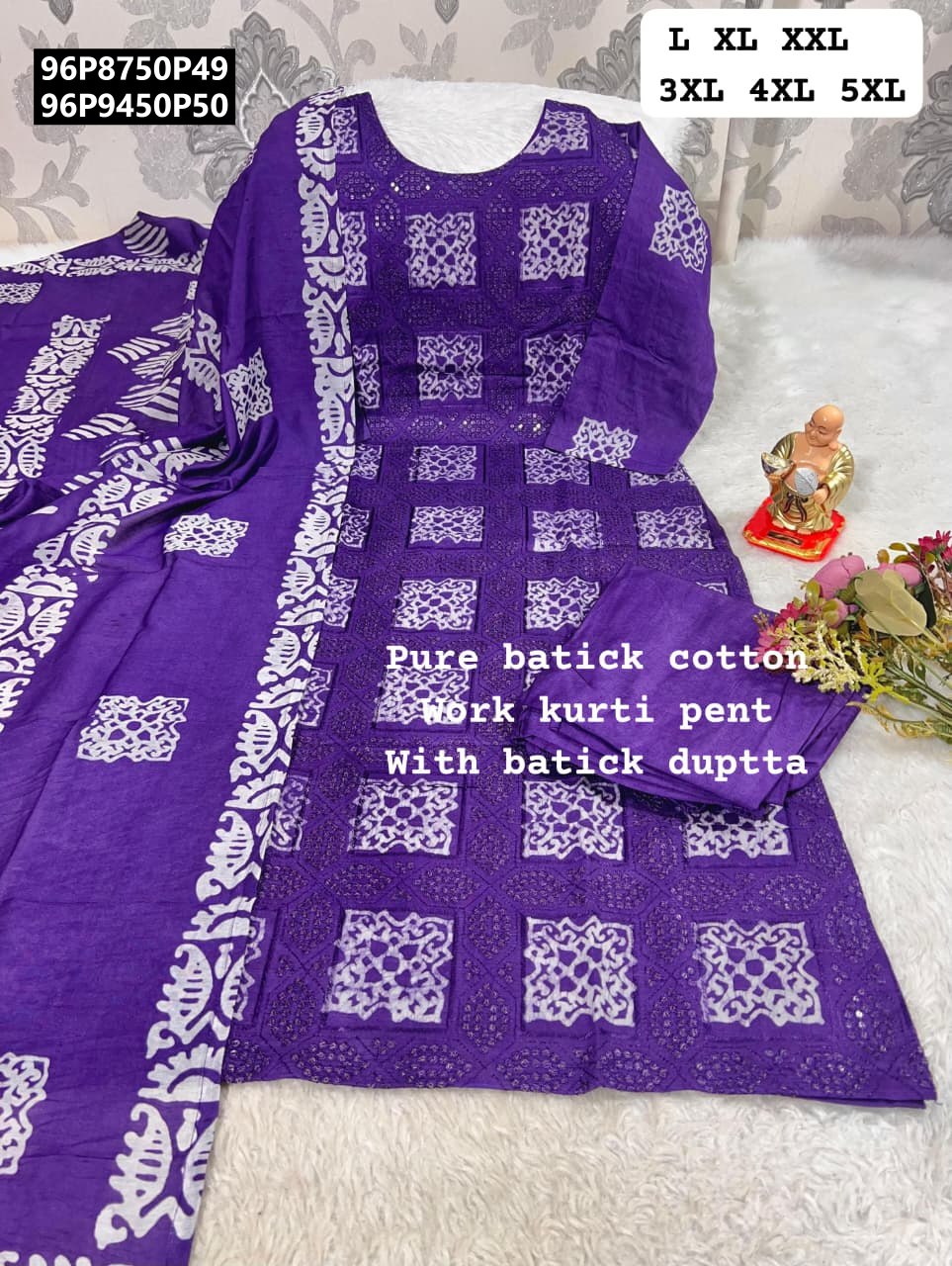 TRENDBUY Royal Purple hand work batik print viscose kurta set with matching dupatta and pants, flat lay on white fuzzy background, showing sizes L to 5XL.