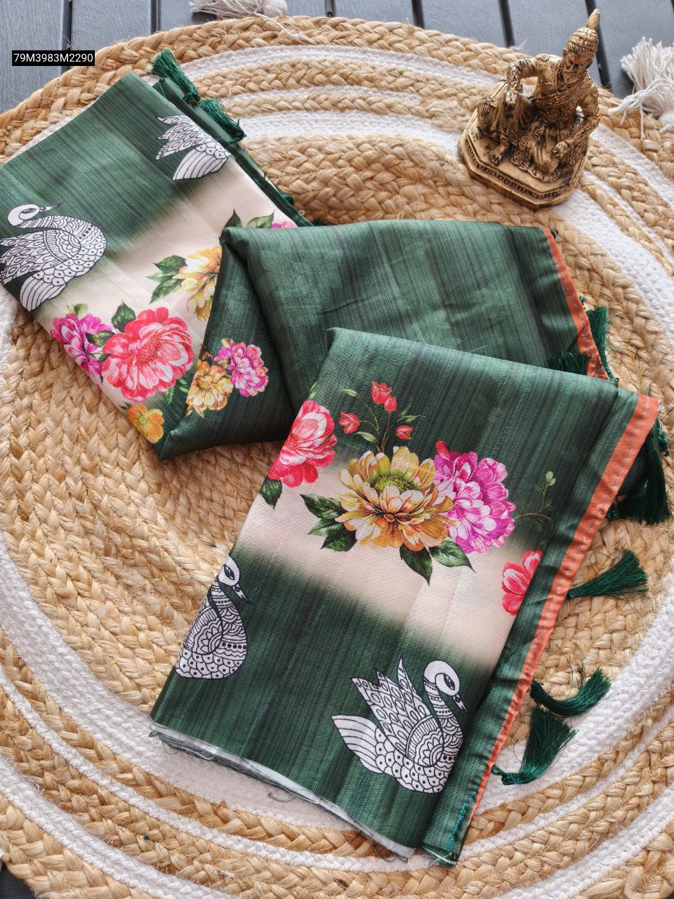 TRENDBUY Green Handloom Tussar Silk Saree, folded, displaying digital floral and swan print with green tassels on a rustic mat.