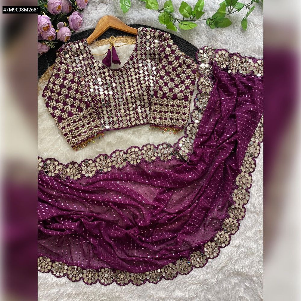 TRENDBUY Wine Faux Georgette Saree with shimmering 5mm sequence work and intricate mirror work lace border, paired with a matching embroidered blouse on a white background.